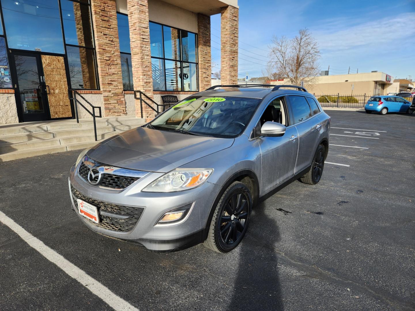 2010 Liquid Silver Metallic /Black Mazda CX-9 Grand Touring (JM3TB3MA6A0) with an 3.7L V6 DOHC 24V engine, Automatic transmission, located at 8595 Washington St., Thornton, CO, 80229, (303) 287-5511, 39.852348, -104.978447 - 2010 Mazda CX-9<br><br>D1 Auto NEVER charges dealer fees! All cars have clean titles and have been inspected for mechanical issues. We have financing for everyone. Good credit, bad credit, first time buyers.<br><br>Please call Lakewood Location 303-274-7692 or Thornton 303-287-5511 to schedule a tes - Photo#1